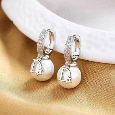 Elegant Pearlized D-Letter Earrings ASTRAL W NOBLE